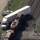 Illustration for article titled Train Crashes Into Houston Truck Carrying Ferrari SF90 Stradale, Other Exotics